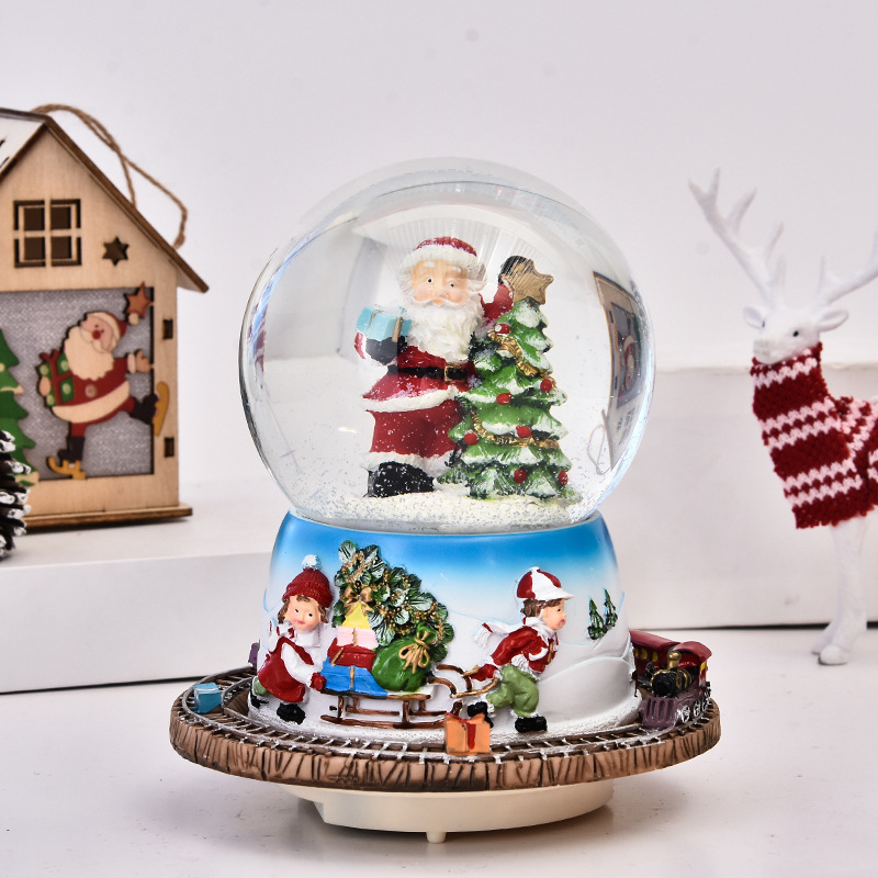 Handmade Customized Polyresin Santa Claus Musical Christmas Blowing Snow Globe with Rotatable Base